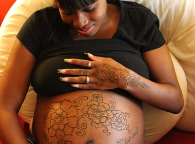 Matching Floral Belly and Hand Designs for Mom To Be