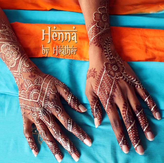 rani henna hands with gilding square