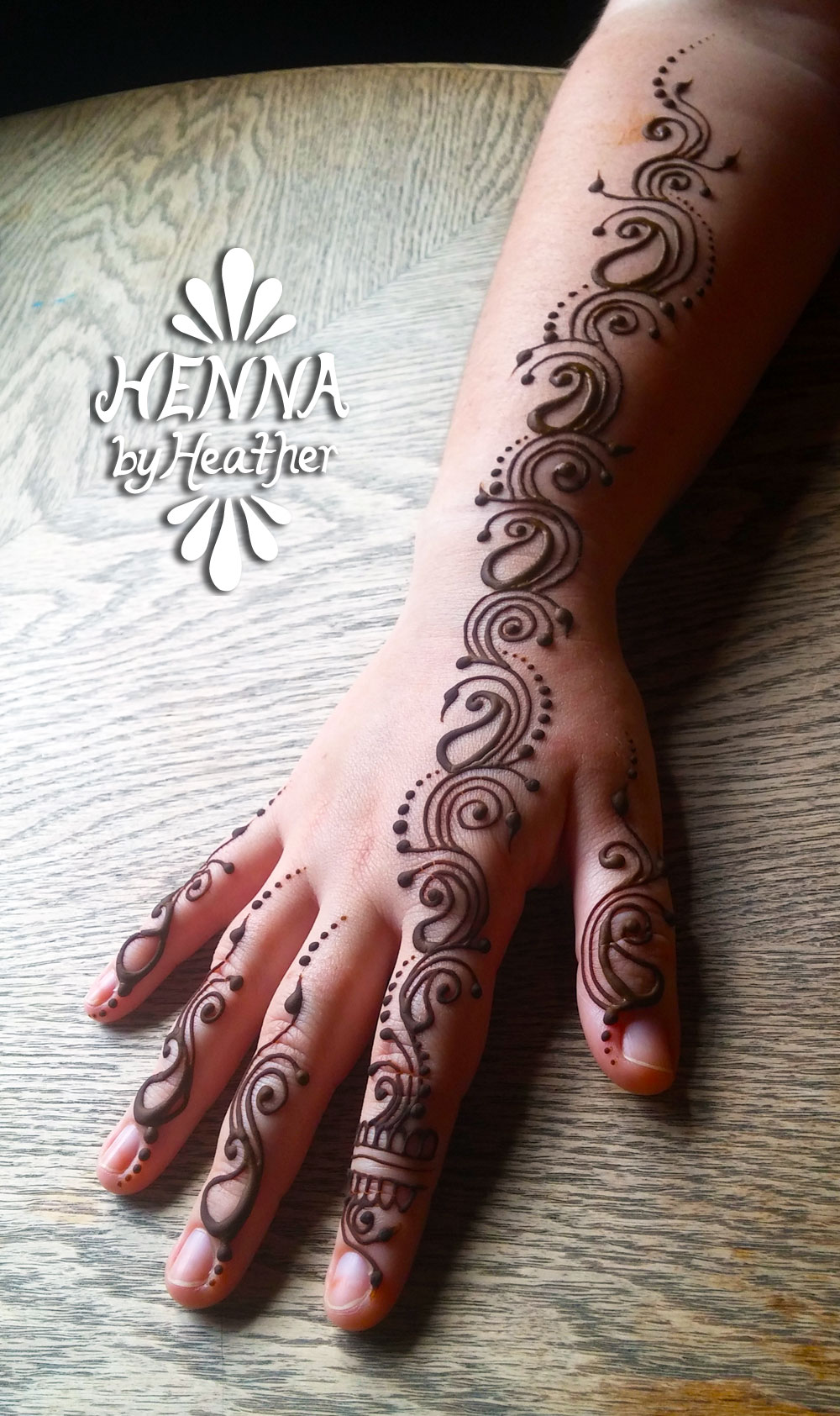 Simple Henna Paisley Hand - HennaByHeather.com